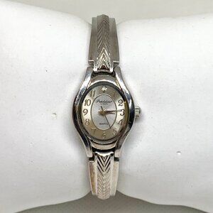 Precision by Gruen women’s silver tone watch 19mm oval quartz analog 6” running